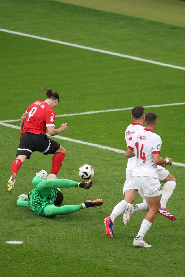 Wojciech Szczesny tripped Marcel Sabitzer to give Austria a penalty