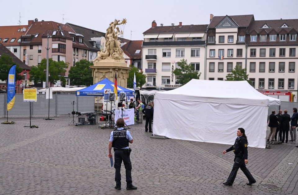 The scene in Mannheim, western Germany after the attack as cops started to complete forensic testing