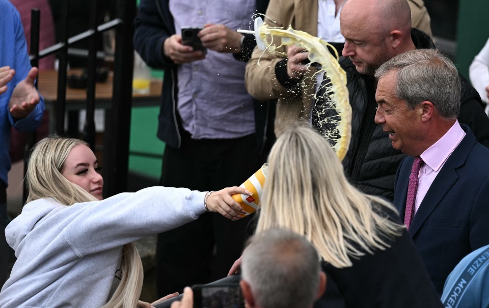 The protester threw the McDonald's banana milkshake in Farage's face