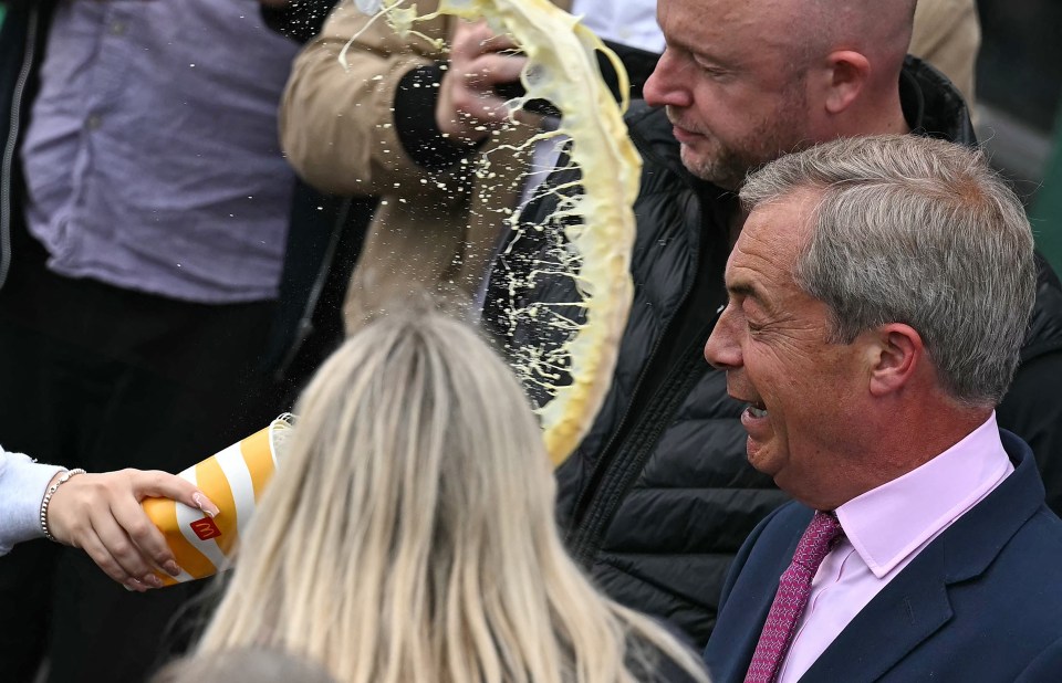 The moment the milkshake hit Farage in the face