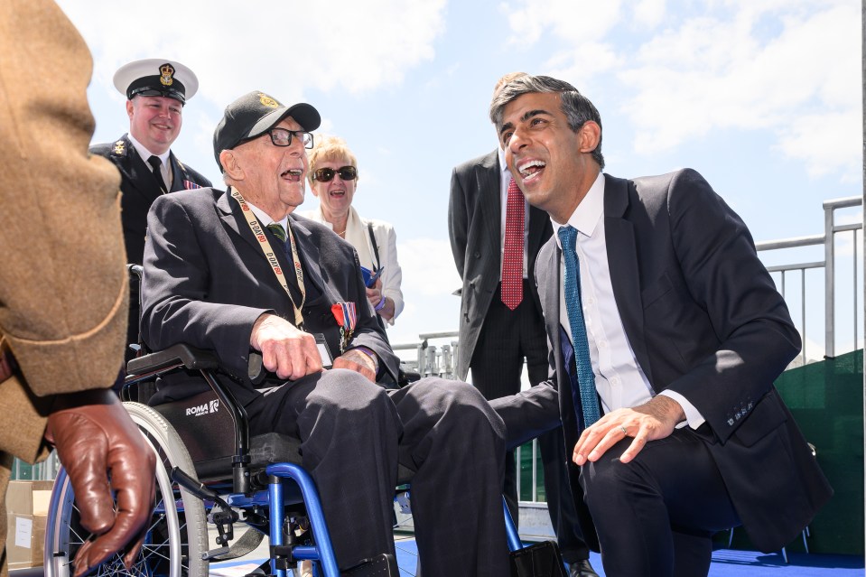 Prime Minister Rishi Sunak speaks with a D-Day veteran in Portsmouth