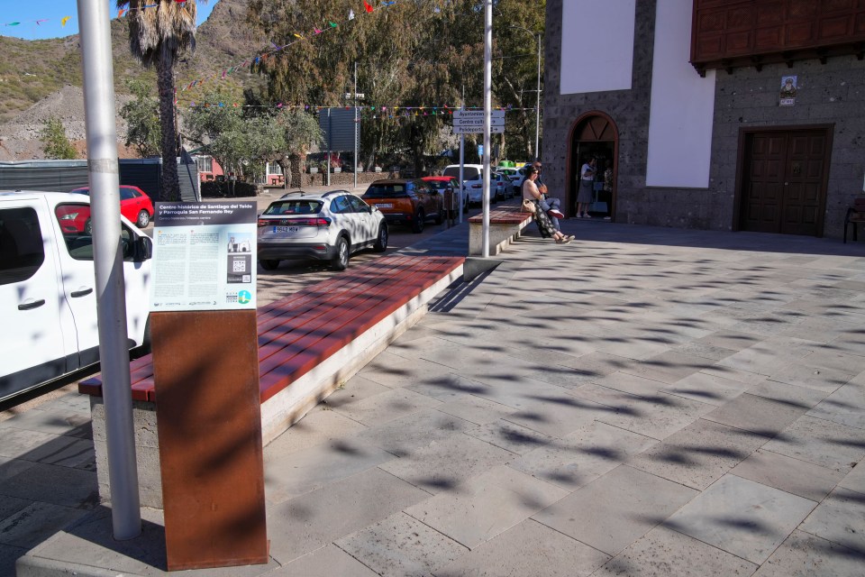 The British teen supposedly sat on this bench near the church with two men