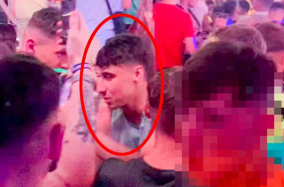 a man in a crowd with a red circle around his head