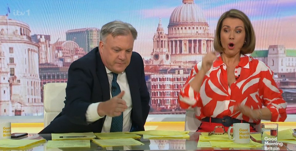 Susanna Reid looks on in horror as Ed Balls swats a pesky fly that had been buzzing around them all morning