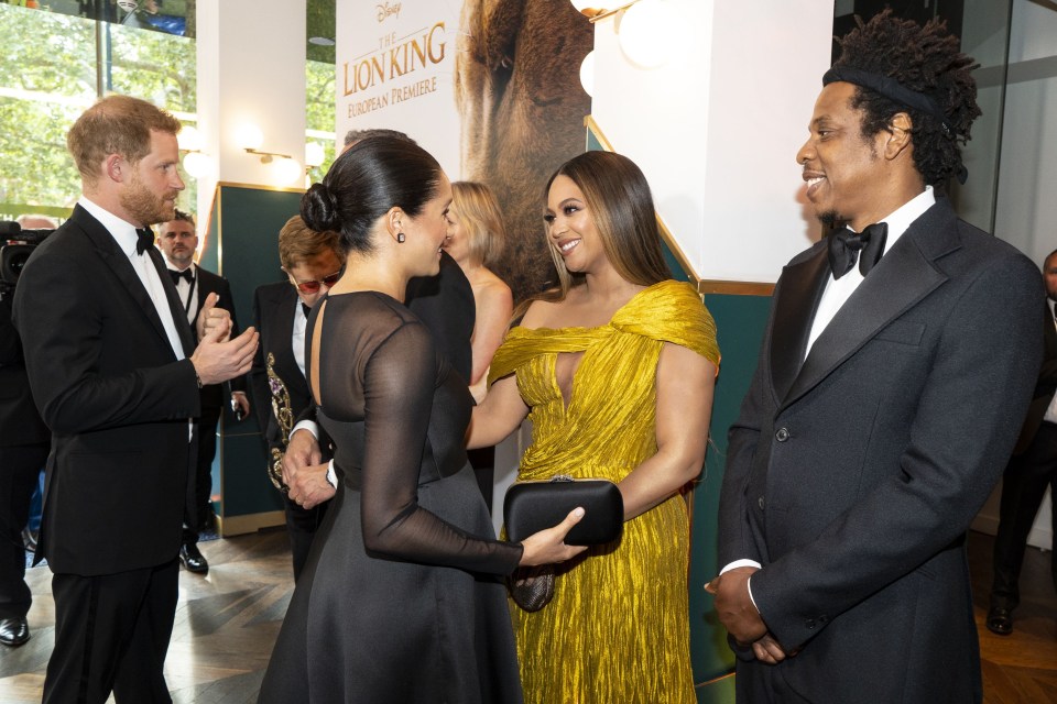 Meghan mingling with Beyonce at the Lion King premiere in 2019