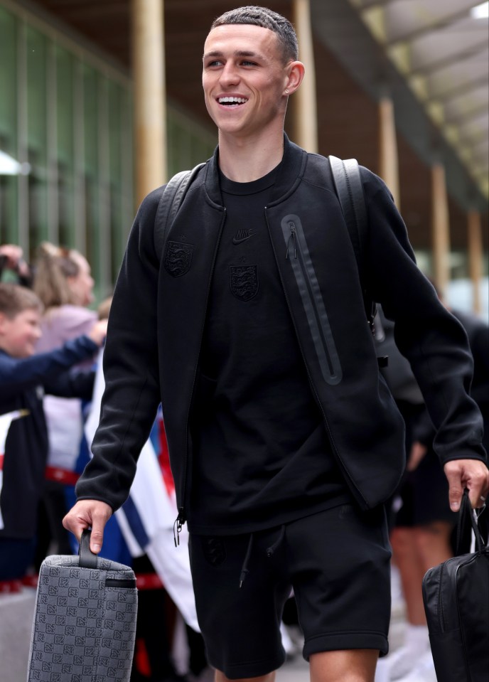 Phil Foden joined the team in their black attire