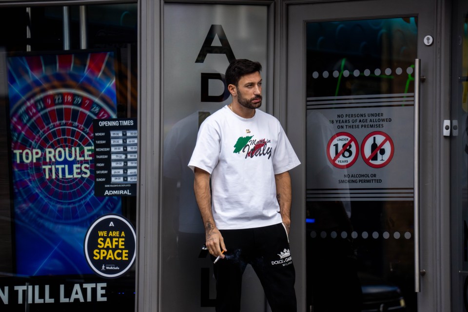 The Italian pro stood in the doorway outside a casino on Tuesday morning