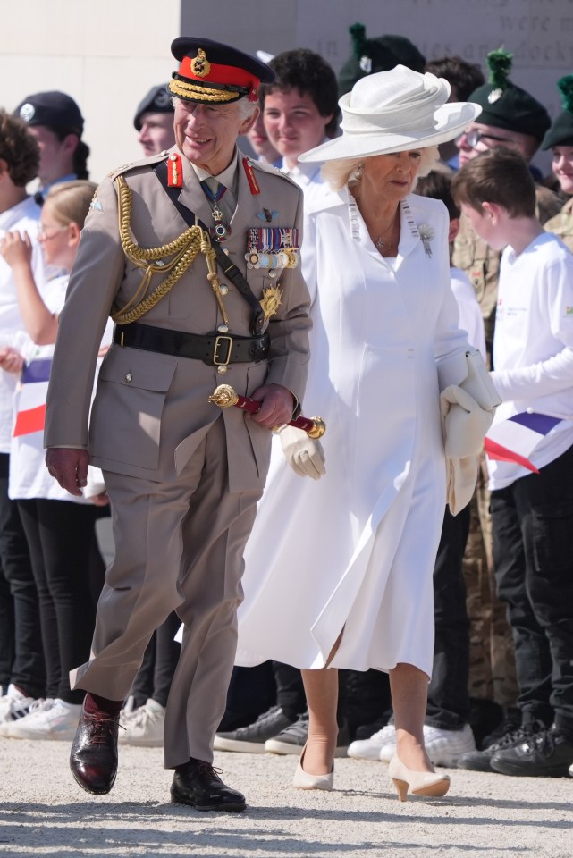 The King and Queen arriving at the UK's national commemoration event at the British Normandy Memorial