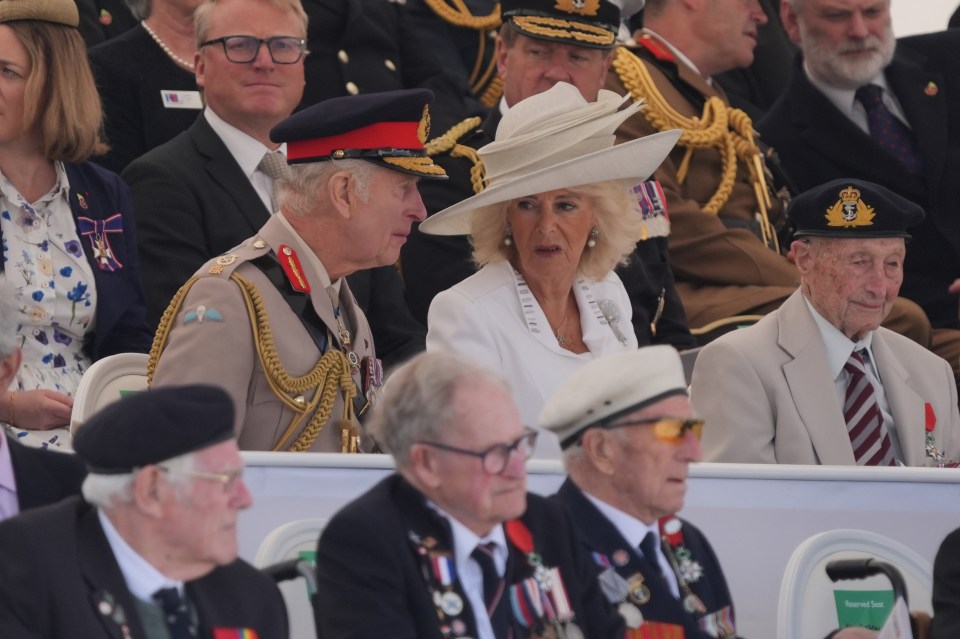 Charles and Camilla sat under a marquee where veterans watched proceedings