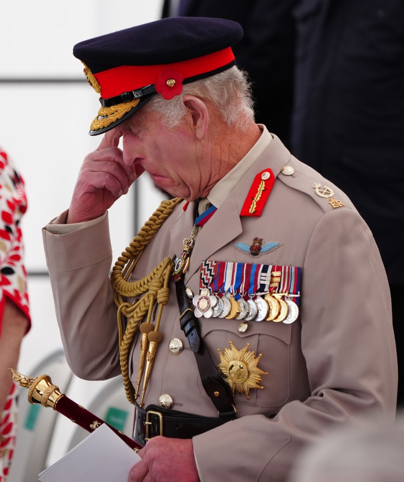 King Charles appears emotional as he prepares to make a speech