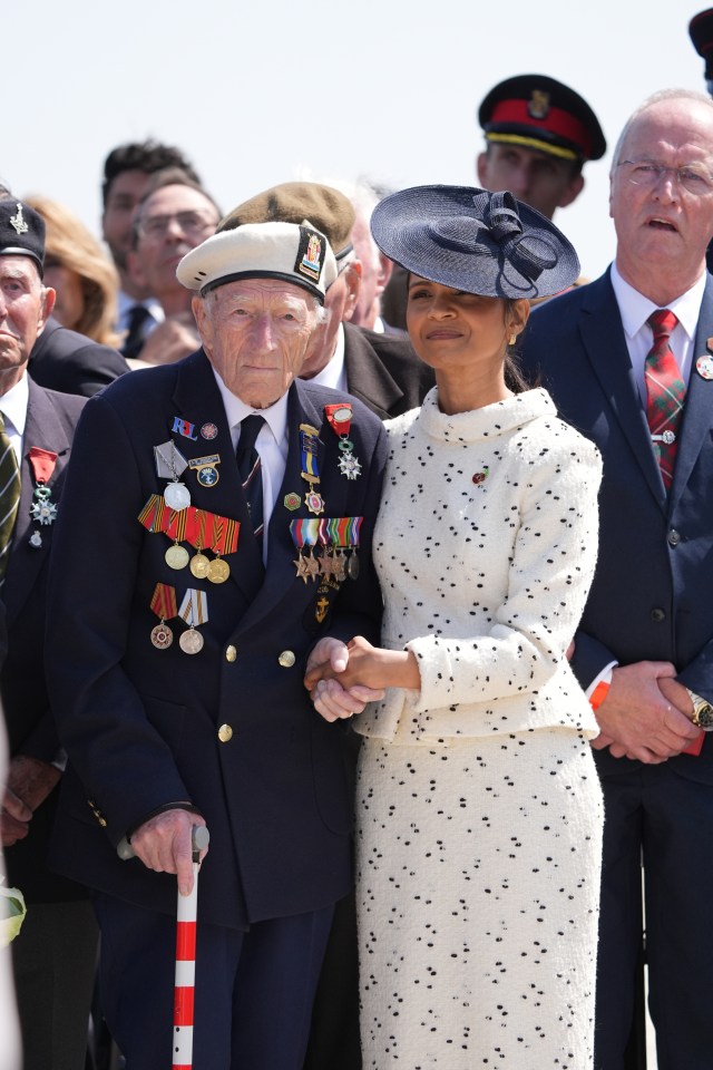 Akshata Murty stands with D-Day veteran Alec Penstone, 98