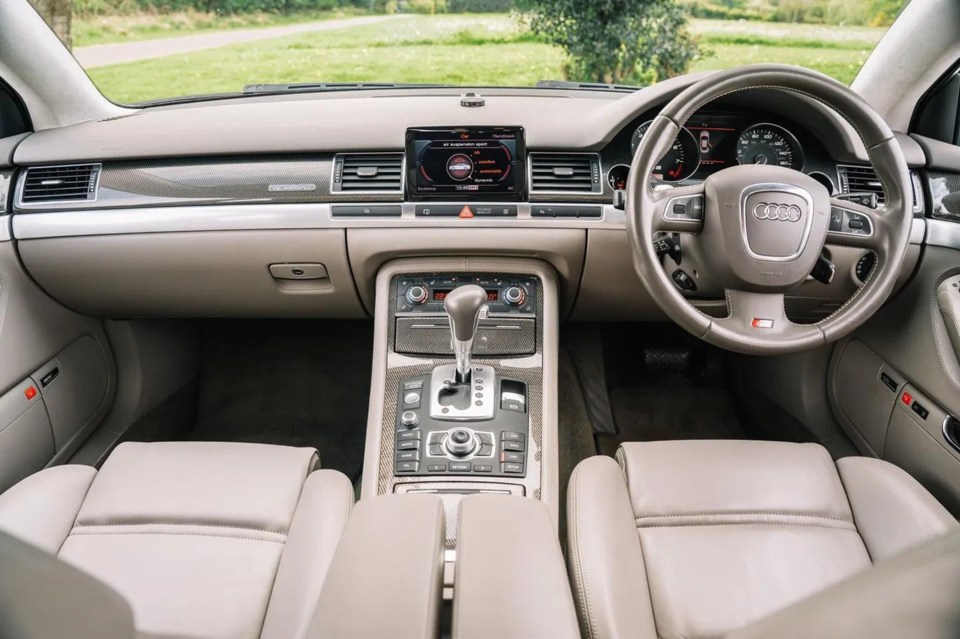 The car's interior has a nostalgic feel to it