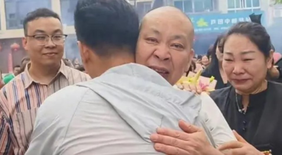 A young man reunites with his parents after 33 years in Wenzhou, Zhejiang, China, Monday, May 20, 2024. They were told their son died immediately after birth. (AsiaWire)