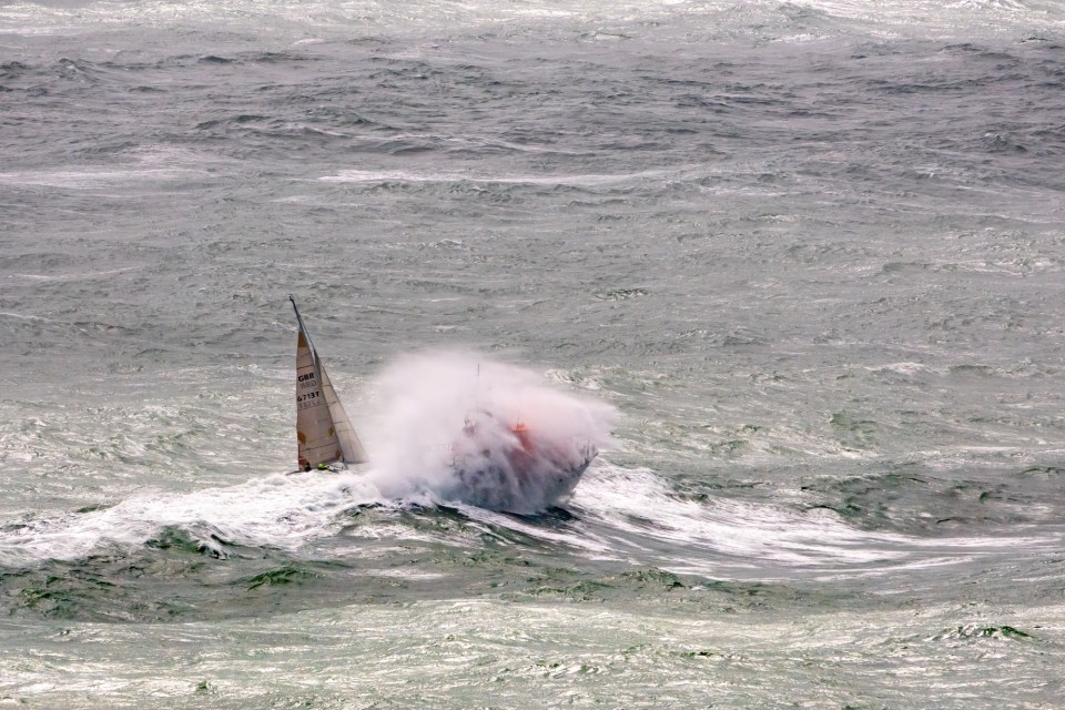 BNPS.co.uk (01202 558833) Pic: JamieRussell/IslandVisions/BNPS Weather input. Pictured: A lifeboat patrolling the race in rough seas. Extreme conditions saw many sailors pull out of an annual yacht race on Saturday with some even capsizing and a crash. The Round the Island Race - a 50-mile circumnavigation of the Isle of Wight - normally attracts one of the largest fleets of any yacht race. But this year the competition faced some of the most severe conditions in years with gusts of over 50 knots recorded at The Needles, the most eastern point of the course. Race organisers cancelled eight classes before the race started. The conditions put off many from entering and many more retired early. After eight hours of racing just 61 boats had completed the course.