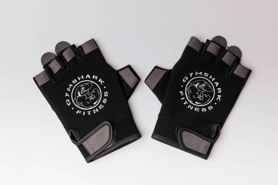 Pair of black Gymshark fitness gloves.