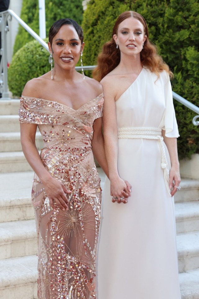 CAP D'ANTIBES, FRANCE - MAY 23: Alex Scott and Jess Glynne attend the amfAR Cannes Gala 30th edition Presented by Chopard And Red Sea International Film Festival at Hotel du Cap-Eden-Roc on May 23, 2024 in Cap d'Antibes, France. (Photo by Colby Tallia/amfAR/Getty Images for amfAR)