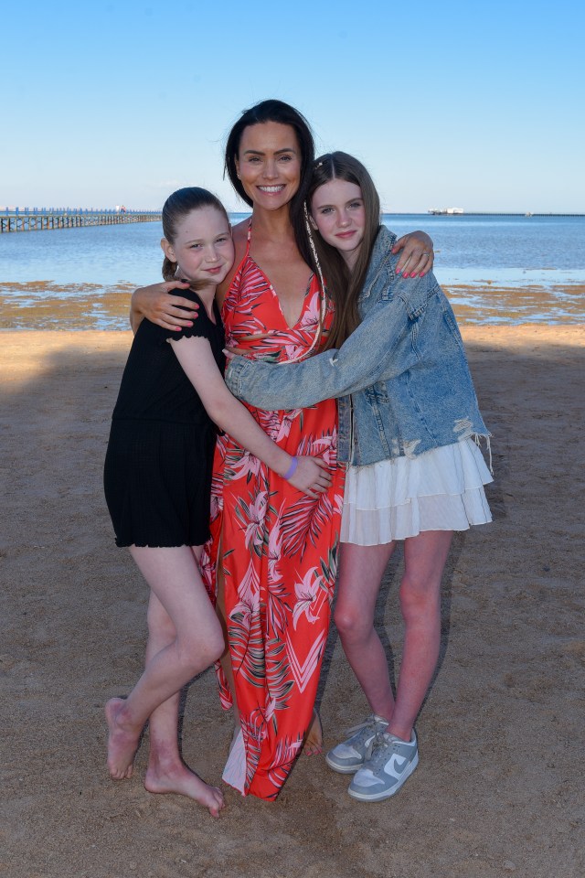 Holly pictured recently with her two daughters Brook and Texas who lost their dad Ross