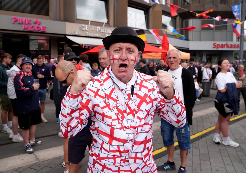 A Three Lions supporter decked head to toe in England colours