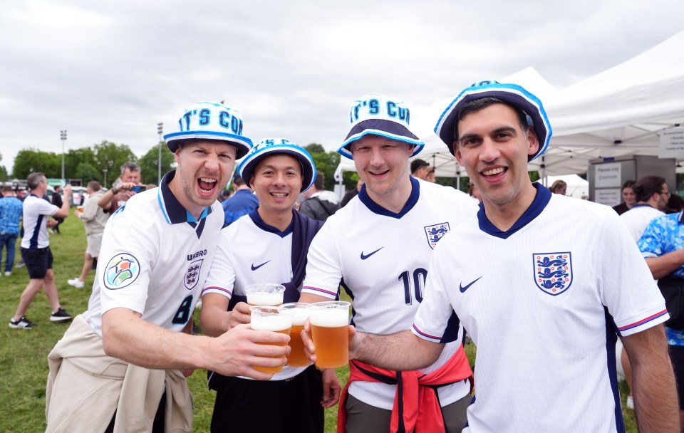 Pals have a livener before the match at a fan park in Gelsenkirchen