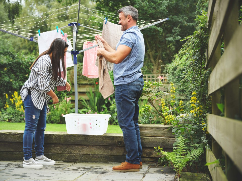 Make hanging clothes fun with a  2-minute laundry workout