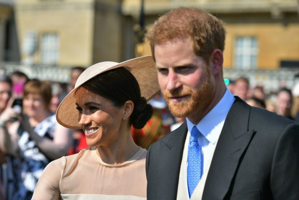  The newlyweds at a garden party at Buckingham Palace