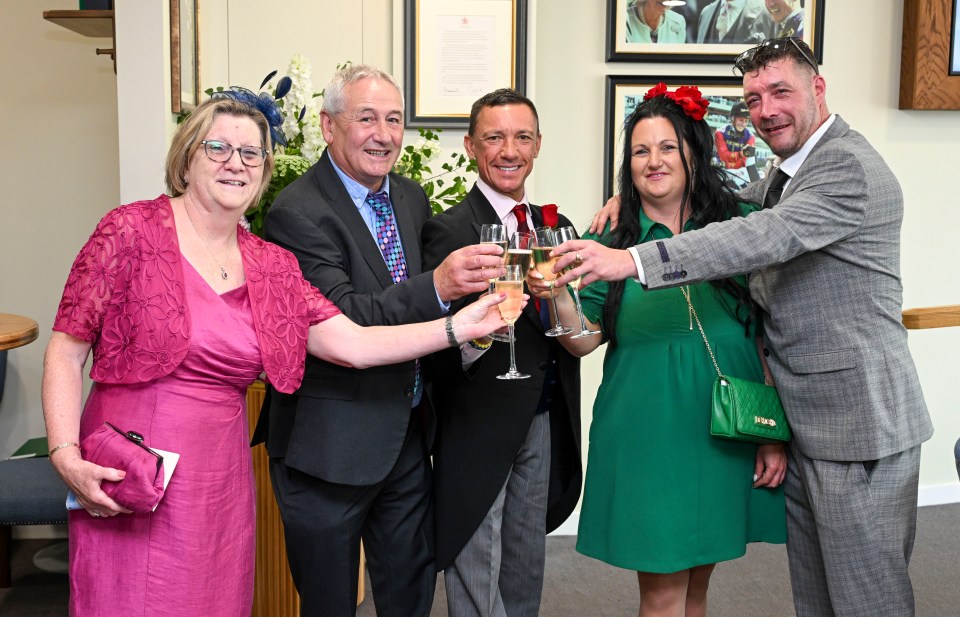 Members Enclosure winners Shirley and Christopher White, left, and Sophie O'Hagen and Dean Collins, right, enjoy a glass of bubbly with Frankie Dettori at Royal Ascot