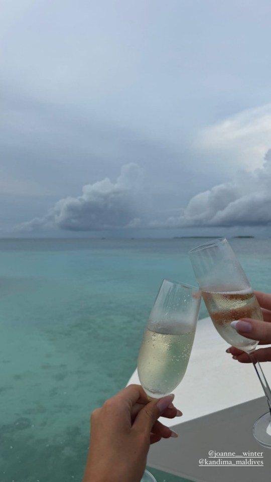 The sisters enjoyed champagne in the pool