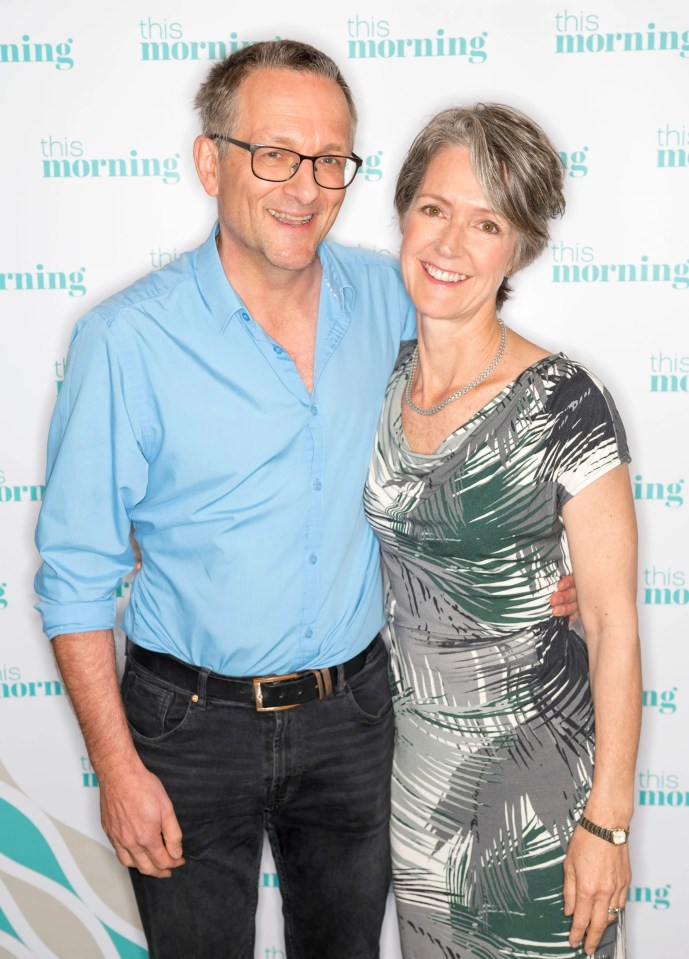 The TV doctor pictured with his wife Clare