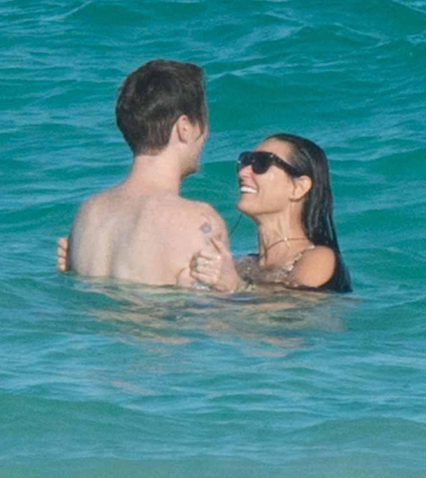 The actress snapped on a holiday with her now-ex, the drummer Sean Friday who is 24 years her junior