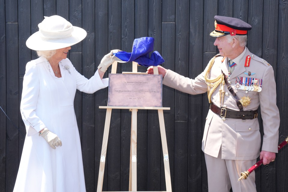 Charles and Camilla unveil a plaque at the official opening of the Winston Churchill Education and Learning Centre