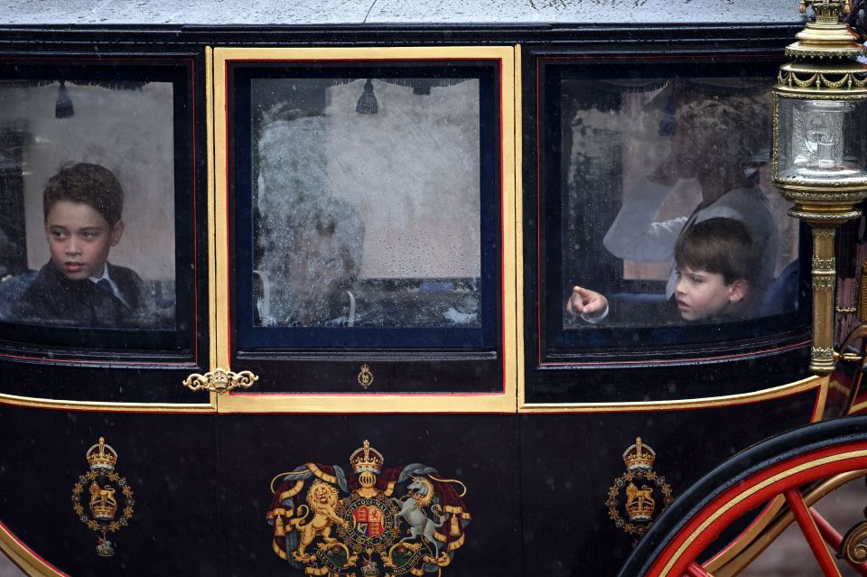 Prince Louis could be seen drawing on the fogged-up windows in the carriage