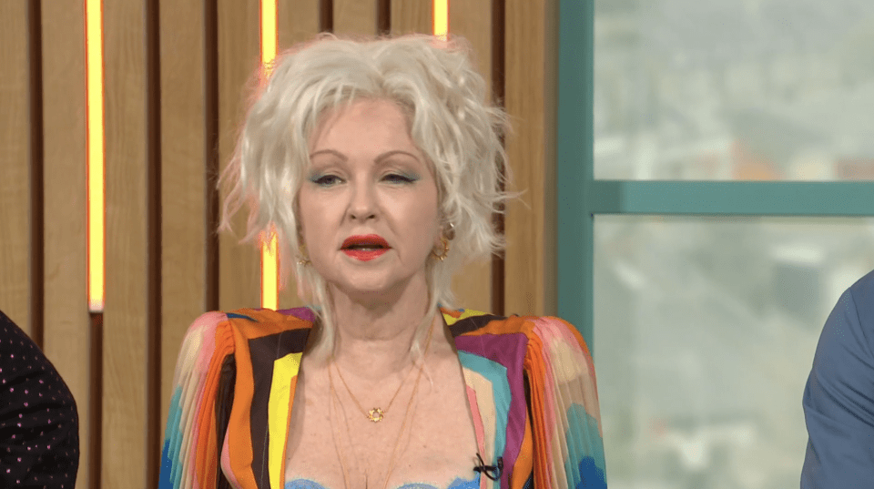 Cyndi Lauper told Channel 4 Sunday Brunch how her longtime friend Cher helped her perfect her autograph.