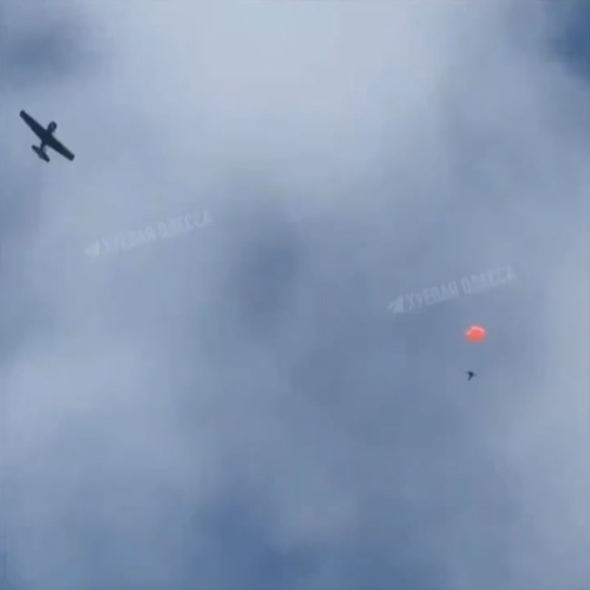 In a separate video, Ukraine's vintage plane - dubbed the 'Drone Hunter' - can be seen circling Russia's Orlan UAV after it took damage from a direct hit over Odessa