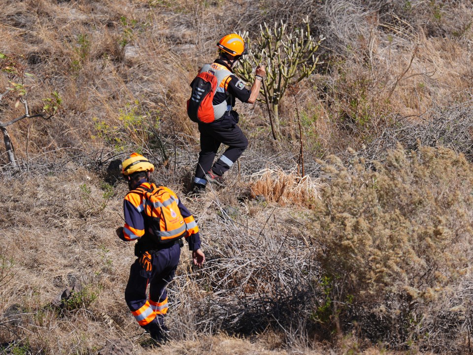 Emergency workers near the village of Masca, Tenerife, where the search continues