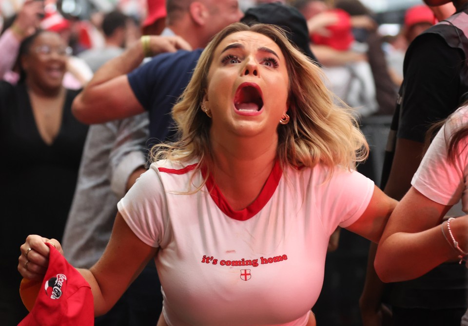 a woman wearing a shirt that says it 's coming home