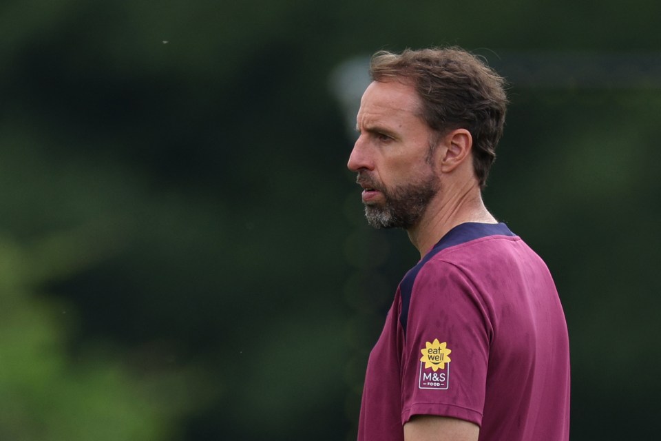 England boss Gareth Southgate looks on during a training session