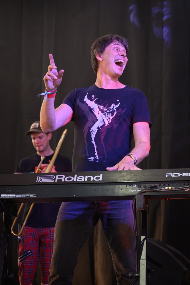 Professor Brian Cox looked elated as he reunited with rock band D:ream for the band's Glastonbury debut