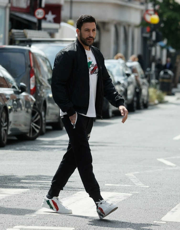 A proud Italian, his shoes and t-shirt both had the country’s flag printed across them