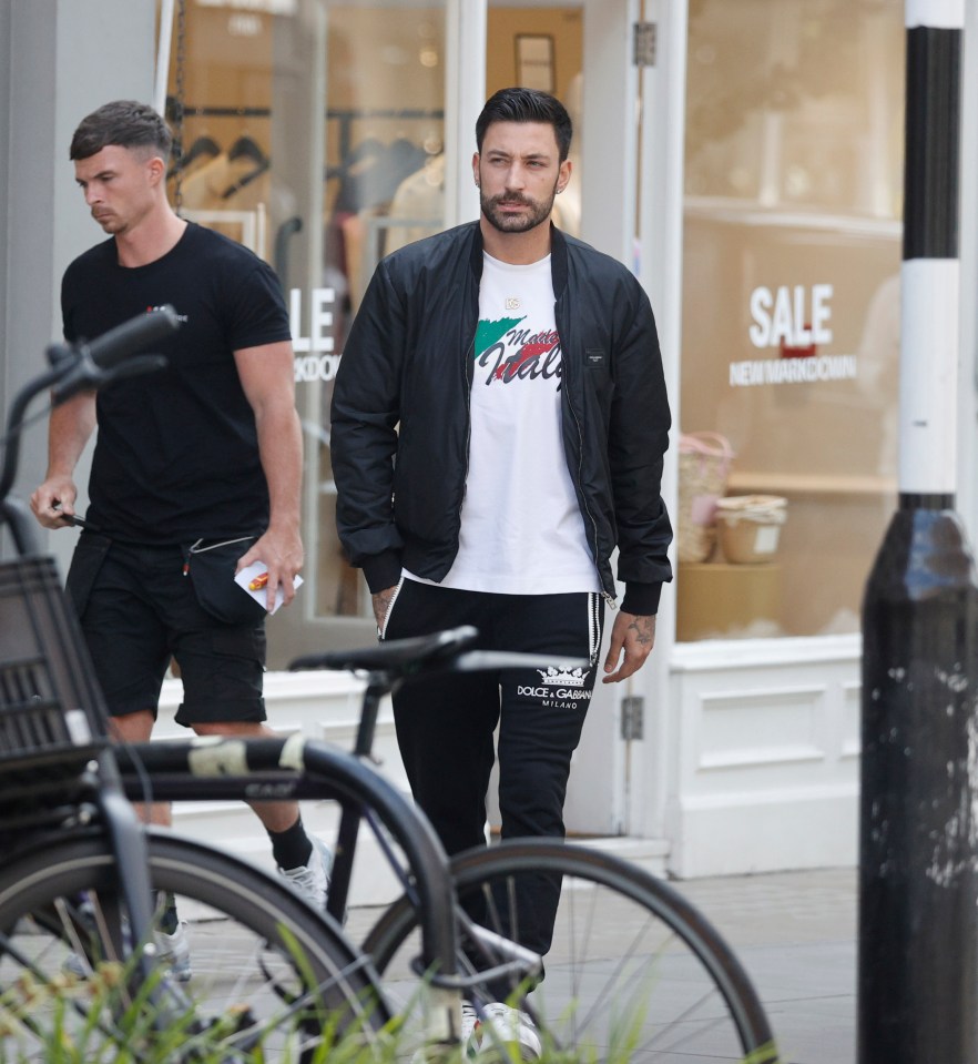 Giovanni Pernice looked tense as he took a morning walk in London