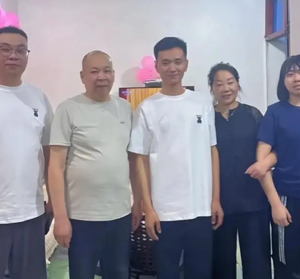 A young man reunites with his parents after 33 years in Wenzhou, Zhejiang, China, Monday, May 20, 2024. They were told their son died immediately after birth. (AsiaWire)