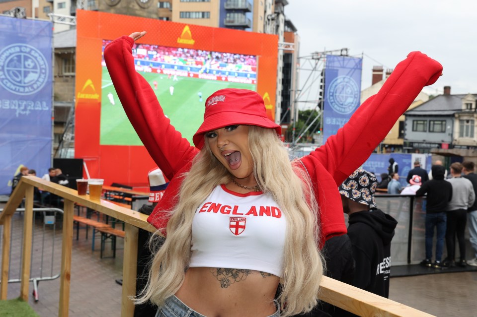 Caitlin Haswell, 24, cheers on England at the fan zone in Times Square, Newcastle