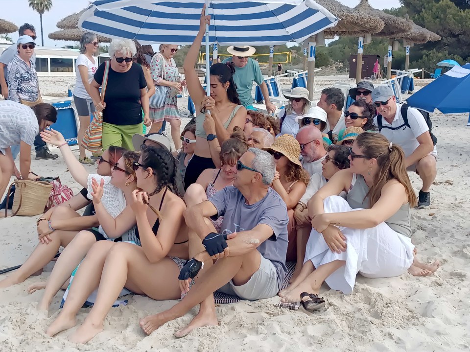 Majorcan families gather on the beach of Sa Ripita on Saturday in protest of mass tourism