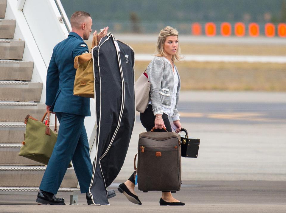 We've previously seen Natasha carrying bags on Kate's royal tours