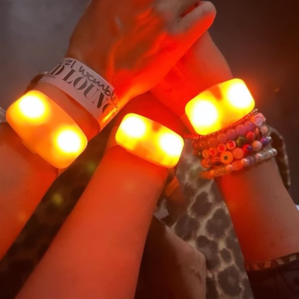 Coldplay lighting up Worthy Farm with their incredible LED wristbands