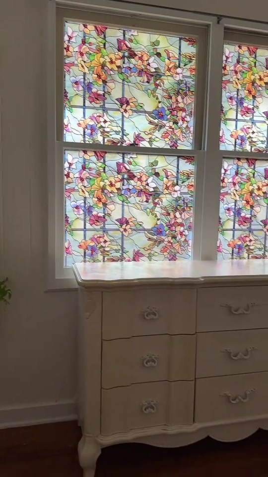 A woman shared how she added a gorgeous privacy film with a floral design to her windows