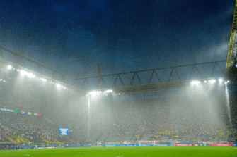 Torrential rain delayed the match for 25 minutes