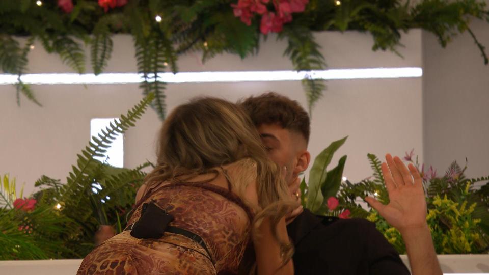 Harriett wastes no time in snogging Ciaran's face