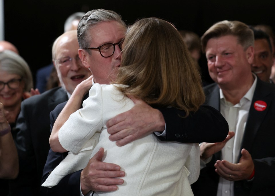 Sir Keir Starmer and wife Victoria share a kiss