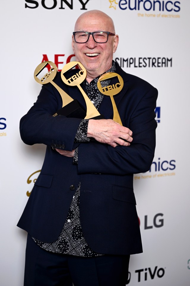 Ken with his three trophies from the Tric Awards