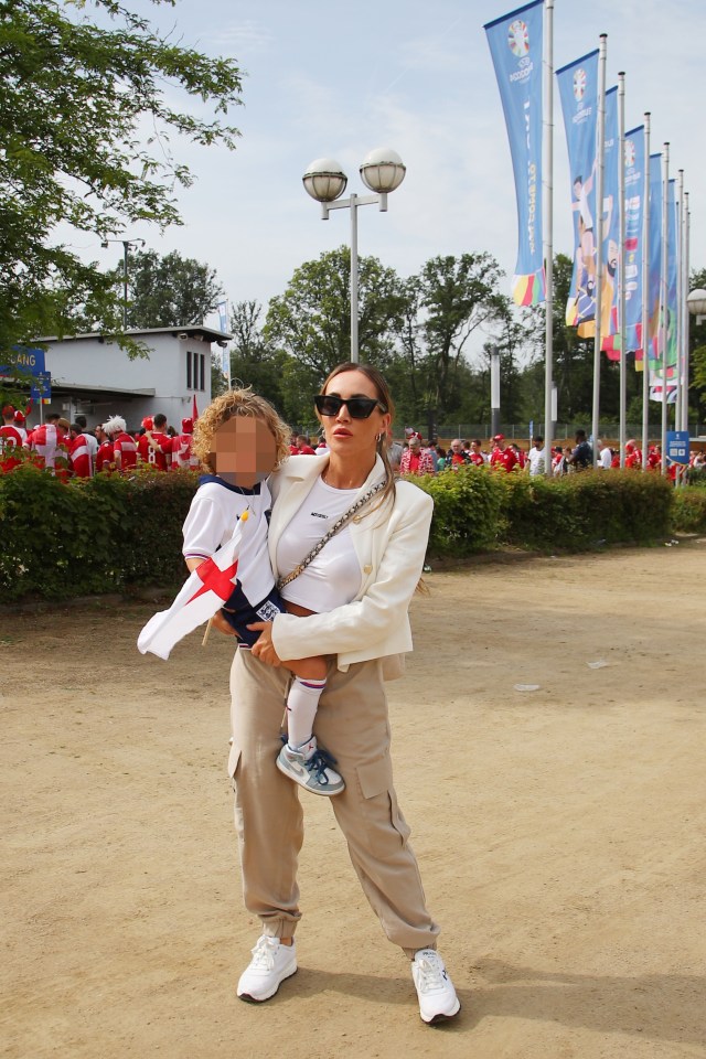 Lauryn with son Kairo at the Denmark game